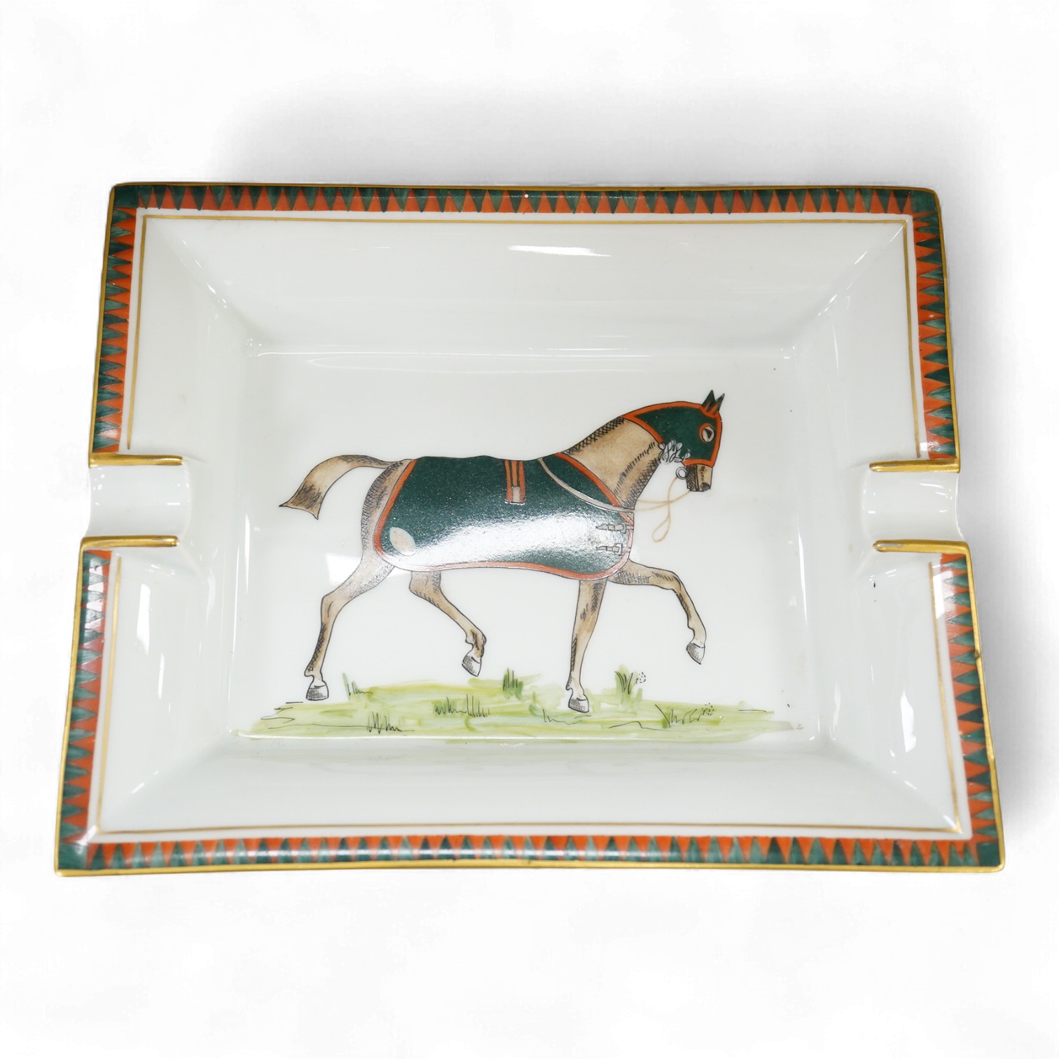 A Hermes porcelain ashtray decorated with a racehorse, 19cm wide